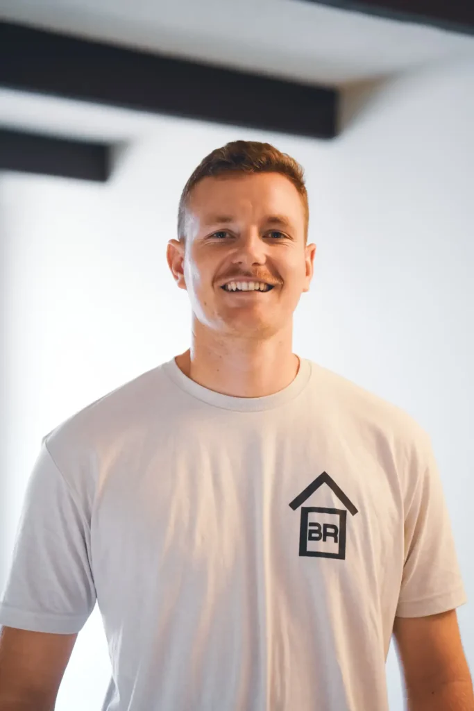 Smiling restoration worker in Mesa, AZ.