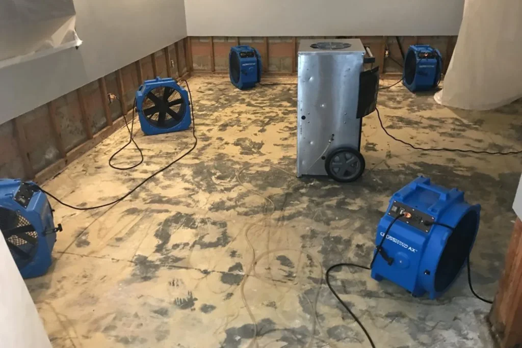 Drying equipment set up in a room in Mesa, AZ for restoration.