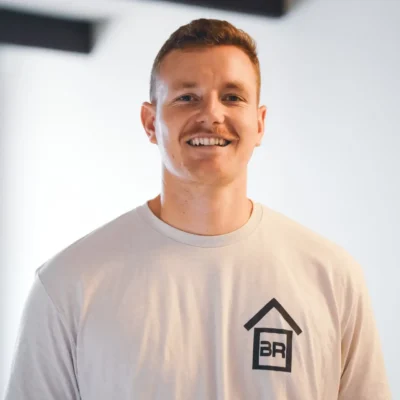 Smiling restoration worker in Mesa, AZ.